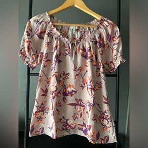 Joie 100% silk short sleeved light pink blouse with orange and purple florals